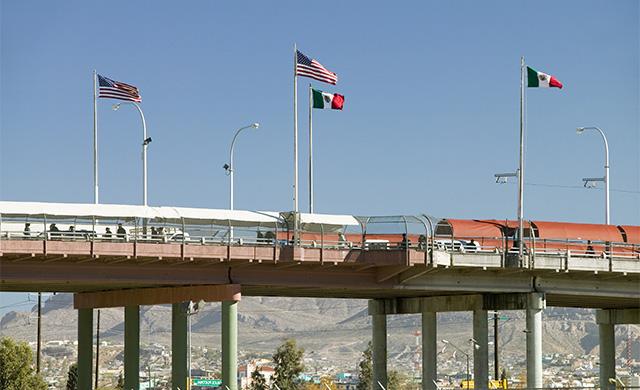 International border of Mexico & the United States, with flags a